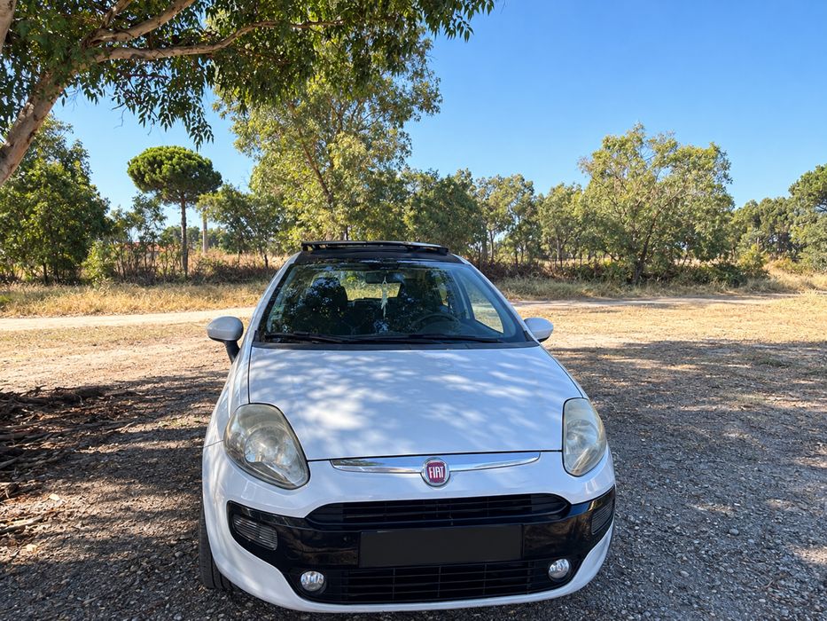 Fiat Grand Punto com teto de abrir 1.2 69cv Gasolina — Setembro de 2011 — photo 4