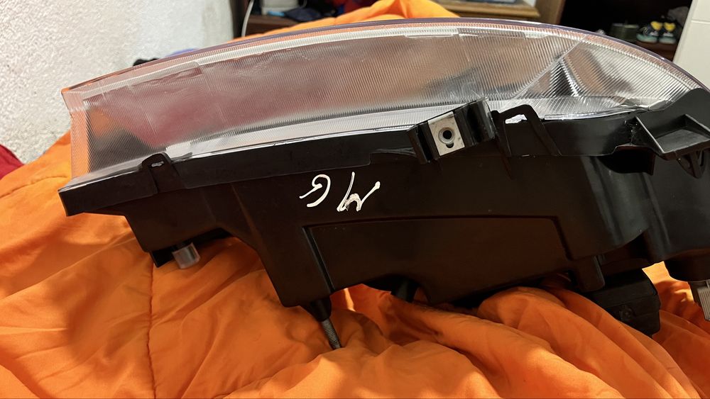Farol reno megane 1999