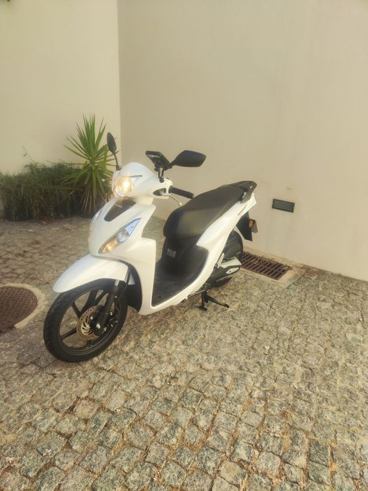 Honda Vision igual nova tudo 100%