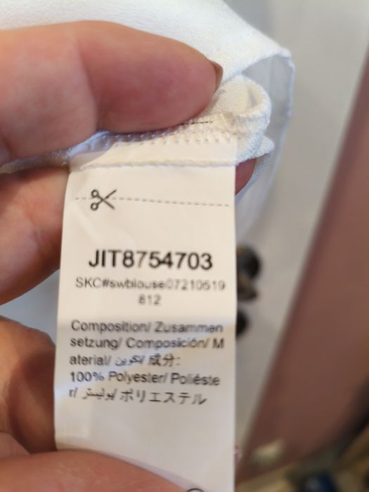 Elegancja biała bluzka dekolt w serek roz. 42-44