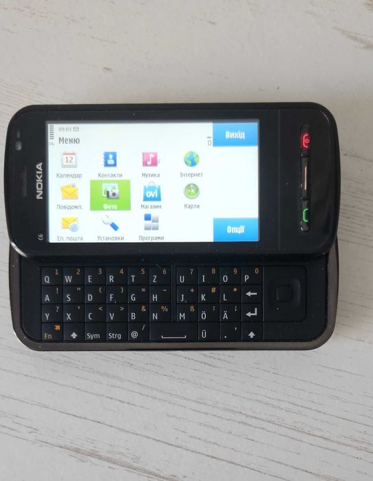 Nokia C6-00  бічний слайдер