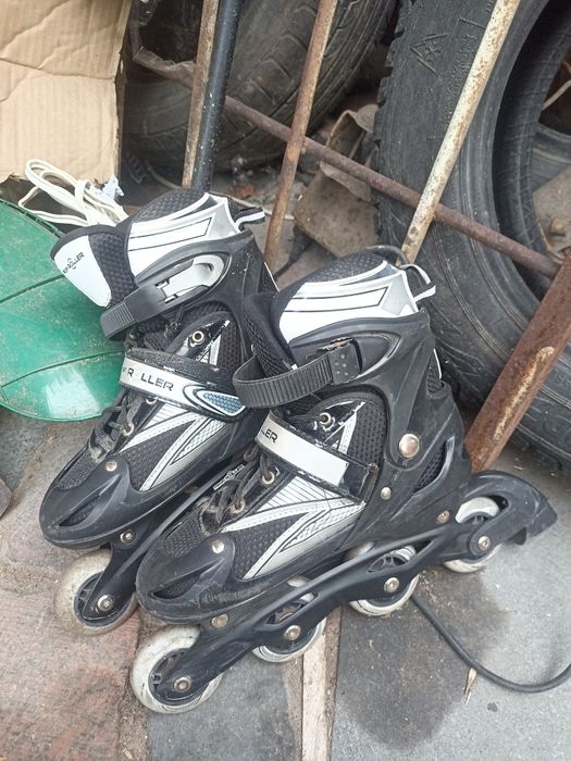 Роликовые коньки