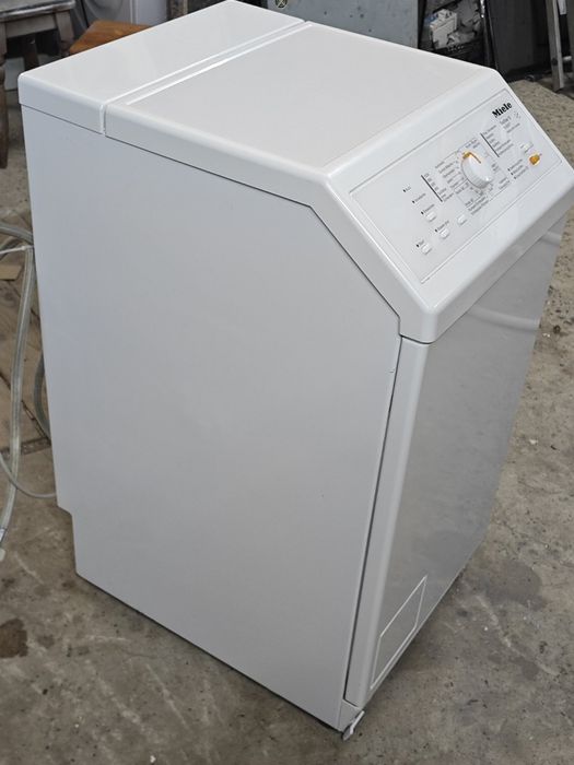 Вертикальна пральна машина Miele TopStar