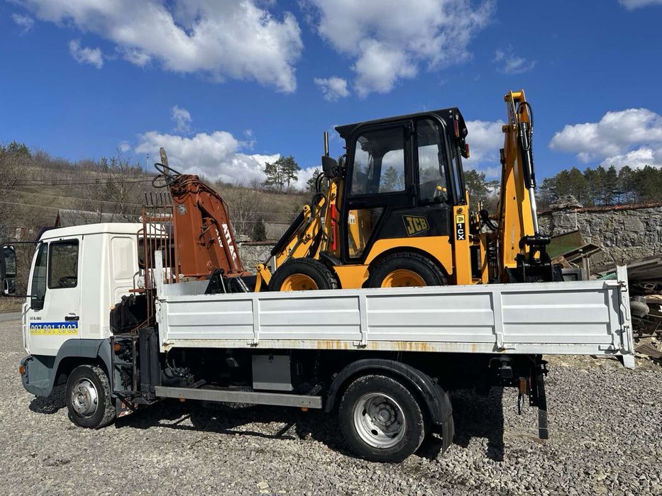 Копання монтування септиків та доставка кілець