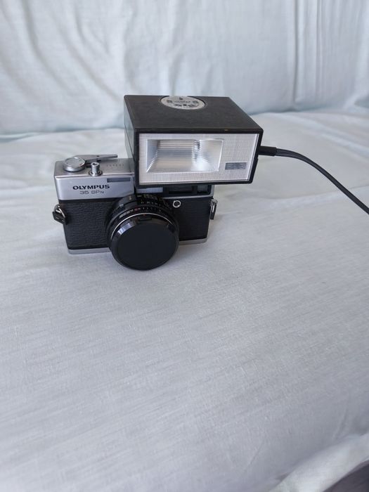 Câmara fotográfica Olimpos com flash