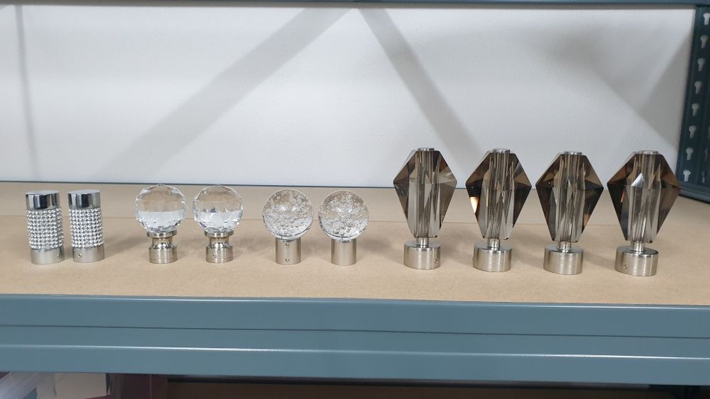 Pontas de varão para cortinados