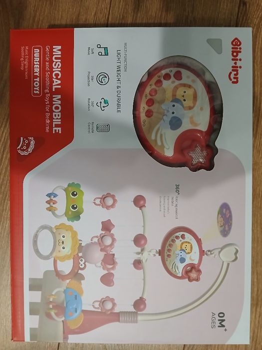 Музичний мобіль 3 в 1 з нічником, проектором і пультом управління.