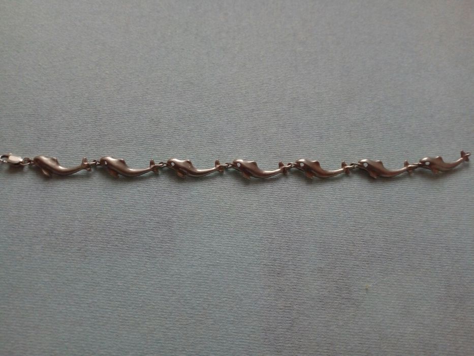 Srebrna bransoletka delfiny