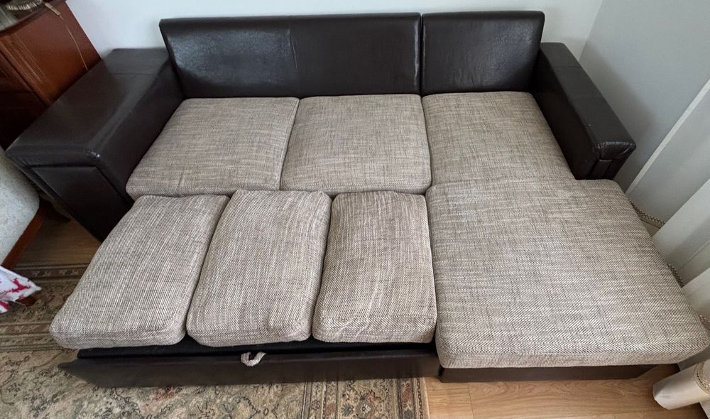 Sofa narożna z funkcją spania + dywan