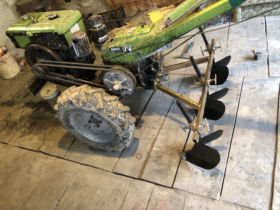 Плуги (марка) до мотоблока