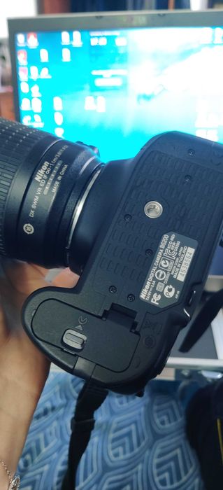 Nikon 5200, Lente, 2 baterias e uma mochila e mais coisas