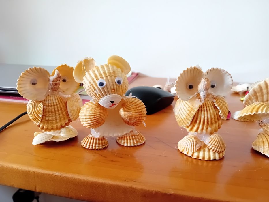 Bonecos em conchas