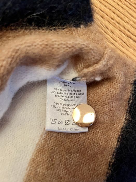 Nowy sweter z wełny merynosów marki Six Ames