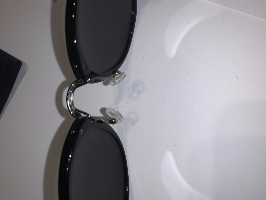 Солнцезащитные очки Prada