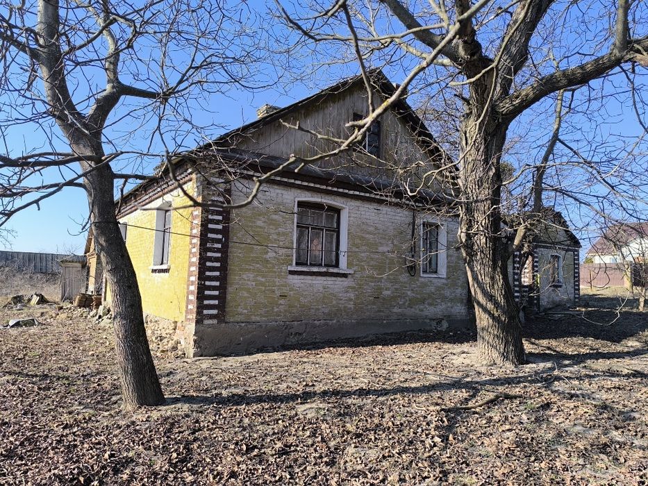 Будинок та земельна ділянка с.Гряди