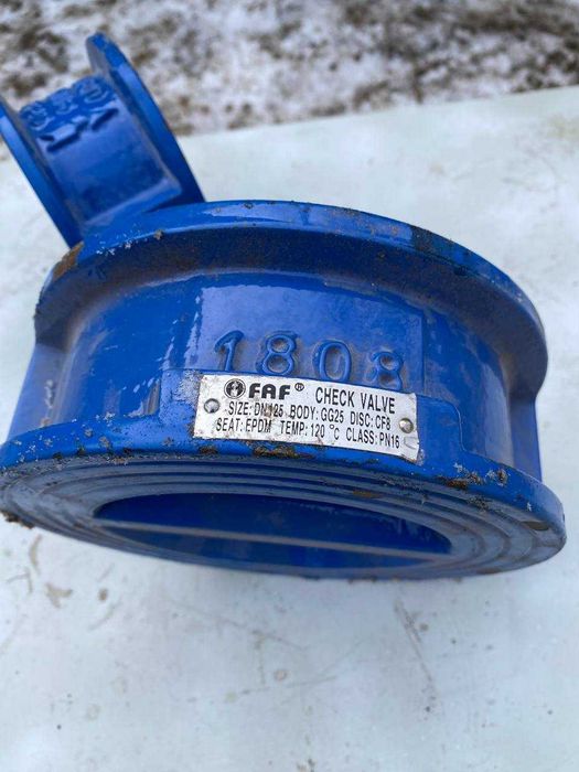 двухстворчатый меж фланцевый обратный клапан.