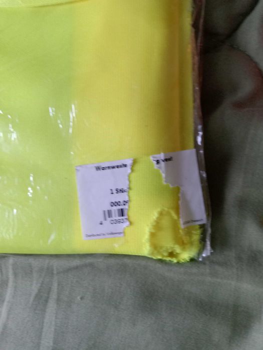 Kamizelka odblaskowa młotek z przecinakiem pasów.