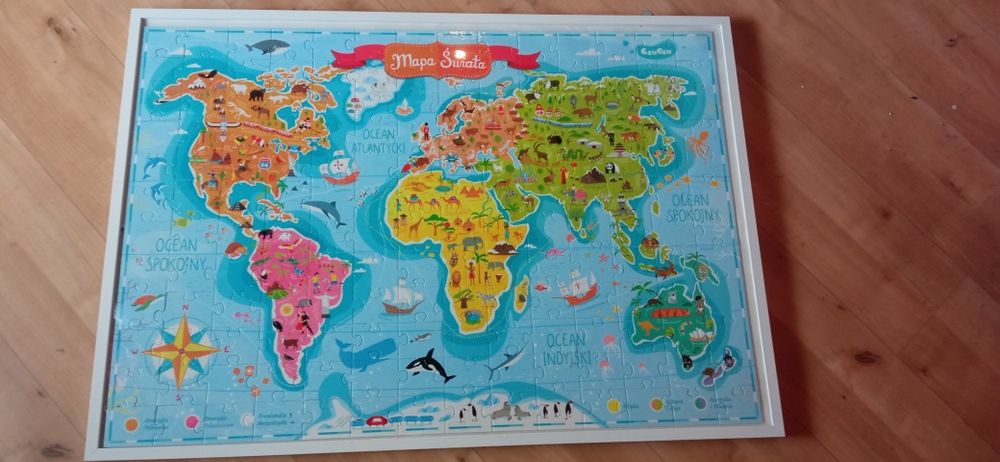 Puzzle mapa świata w antyramie
