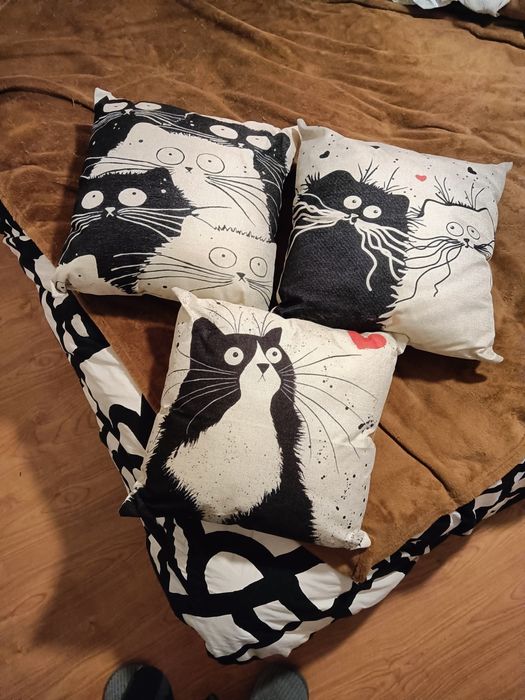 Almofadas com motivos de gatos