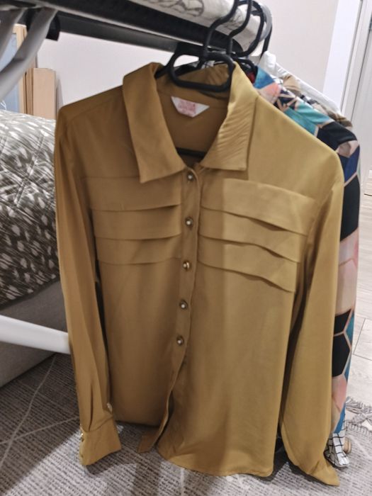 14 koszul w rozmiarze S/M lub oversize. Bez zniszczeń