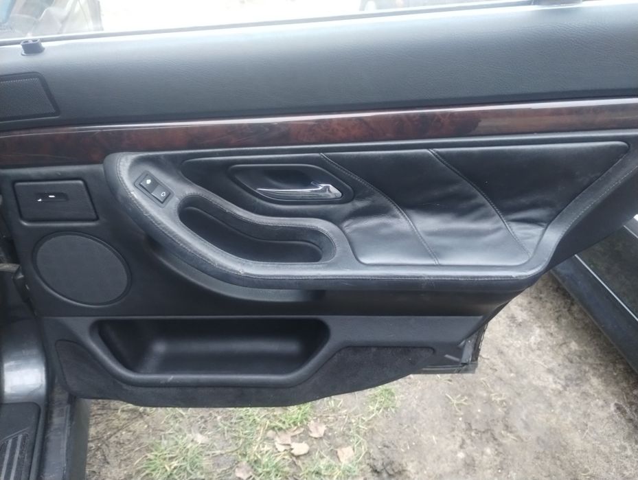 BMW e38 boczki drzwi skóra szyte rączki komplet
