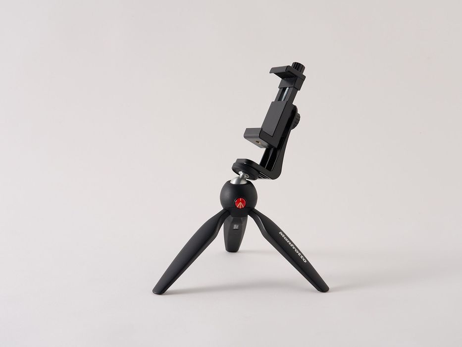 Mini tripé Manfrotto + suporte telemóvel