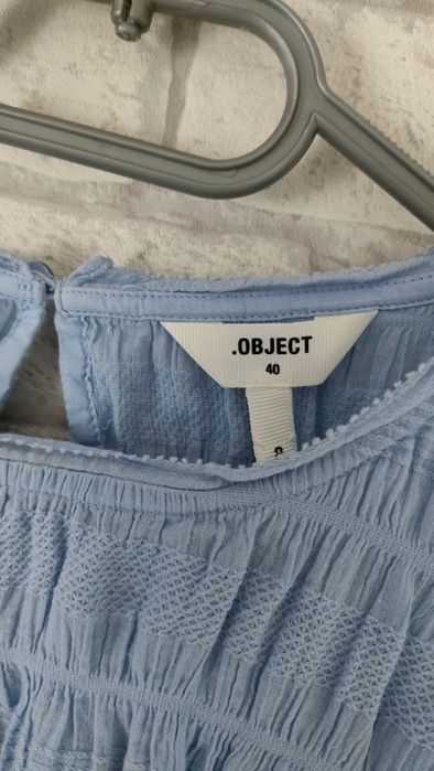 Niebieska bluzka z falbanką L