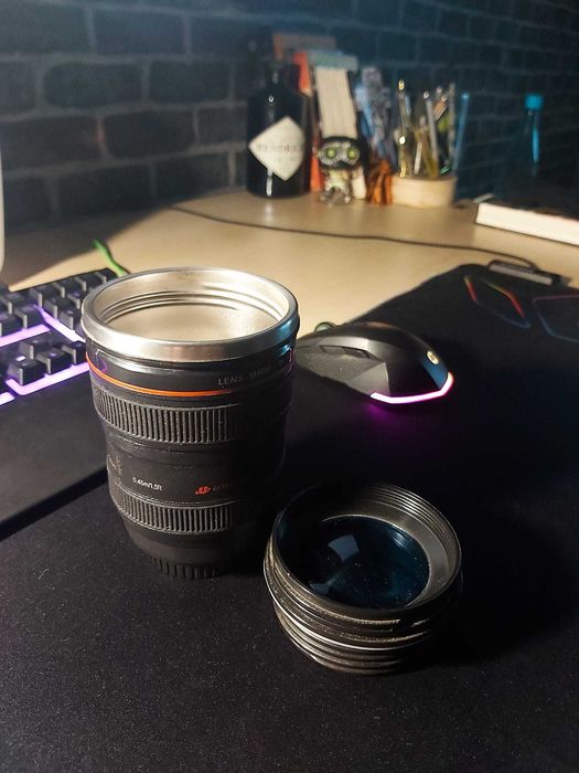 Copo lente fotográfica