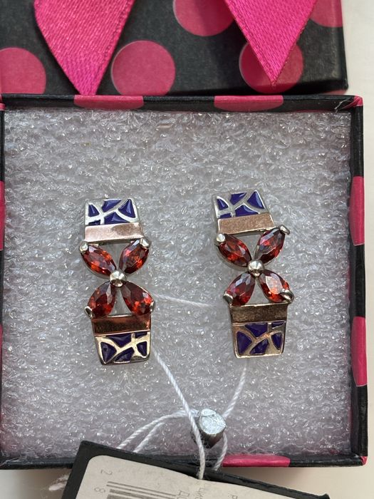 Срібні сережки з емаллю та вставками золота