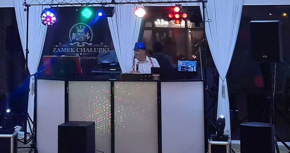 Oprawa muzyczna DJ + wodzirej lub Zespół muzyczny.