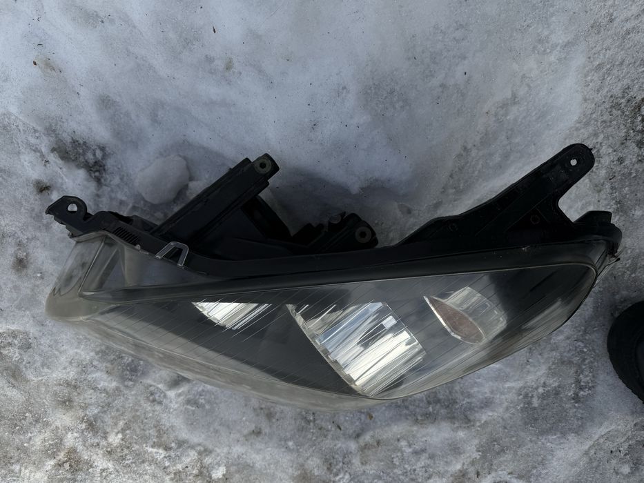 Фари передні, оптика Опель Астра Аш (Opel Astra H)