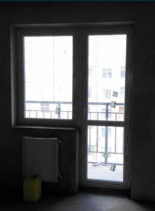 Металопластикові балконні двері і вікно.