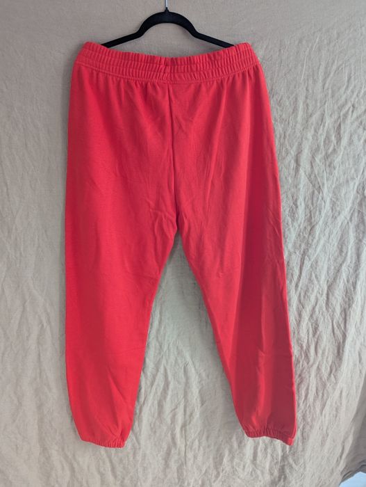 Спортивні штани Nike колір червоний лосось