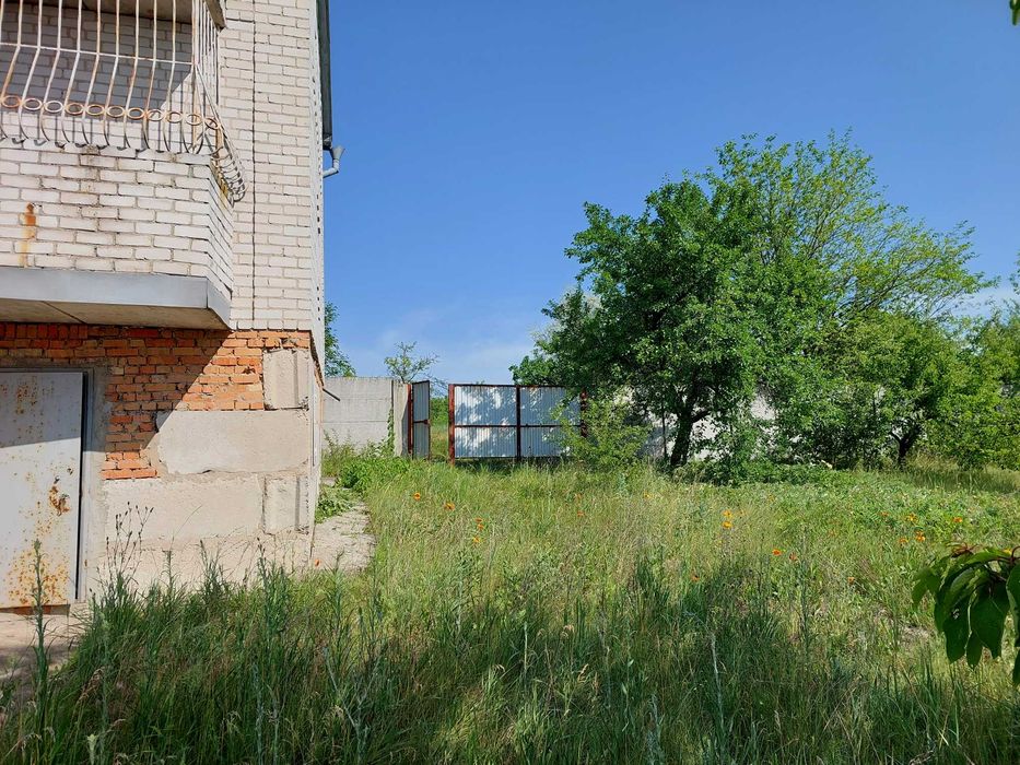 Продам дом с участком в г. Подгородное