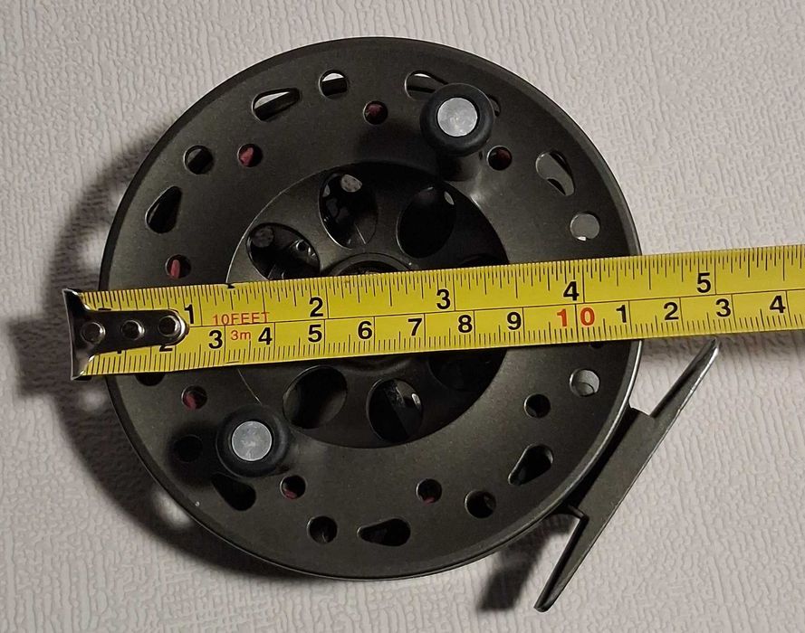 Kołowrotek z ruchomą szpulą Ron Thompson