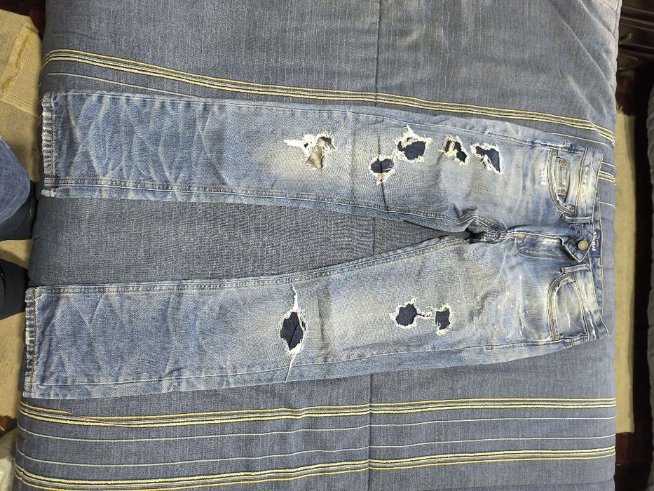 Calças semi usadas