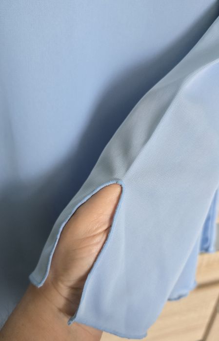 Błękitna bluzka 44 asymetria z kółkiem