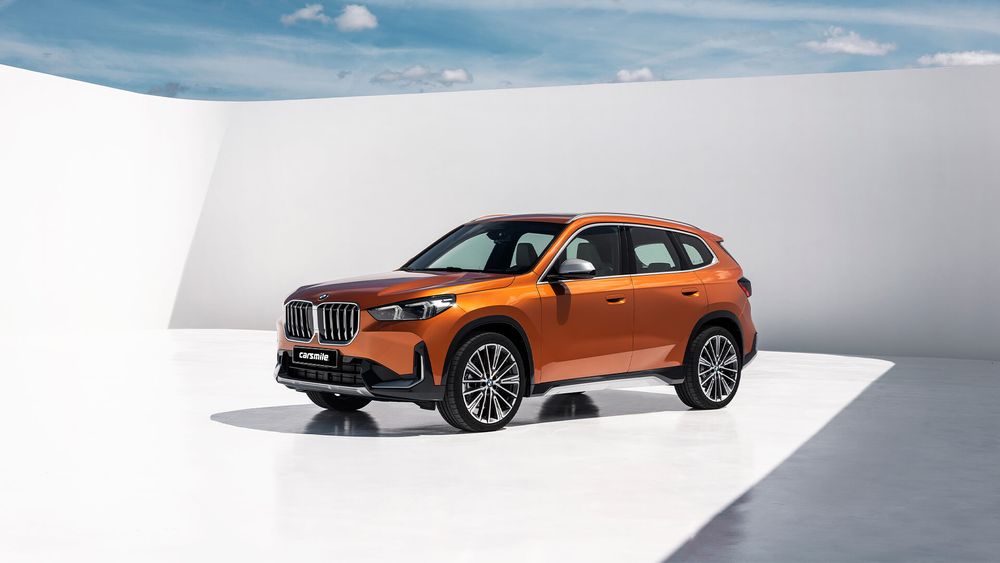 BMW X1 2022 pomarańczowe z lewej strony 