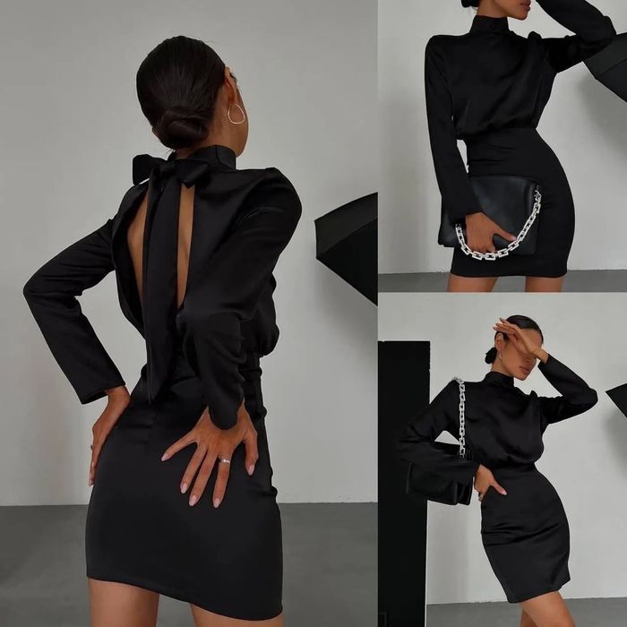 Коктельна чорна сукня. З відкритою спиною