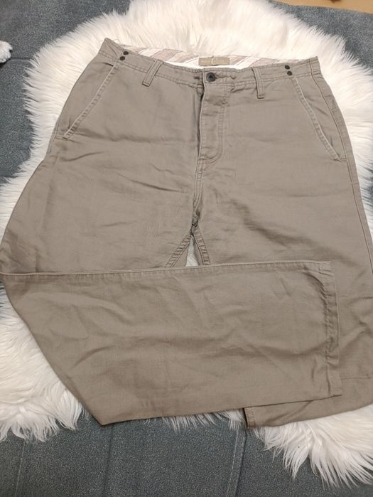 Spodnie męskie eleganckie beżowo szare 33/32 Philip Russel