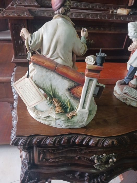 Estátua de pintor