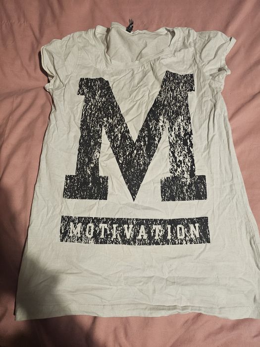 Sprzedam używaną bluzke divers Białą