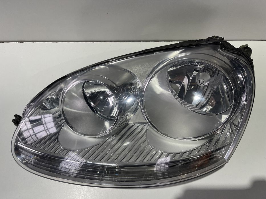 Фари оптика фара Гольф 5 03-09 Hella фари передні Golf 5 Jetta