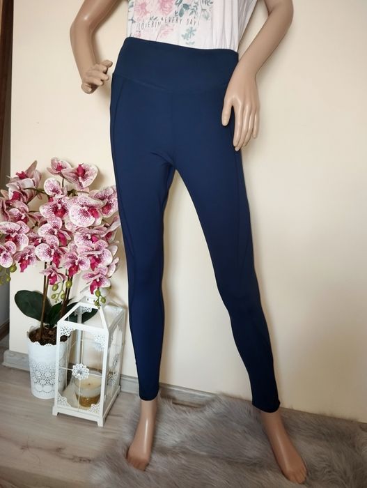 Leginsy modelujące wysoko stan sportowe wstawki z siatki legginsy osią
