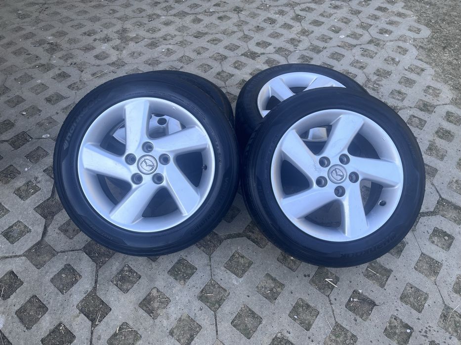 Komplet kół Mazda R16 – 2x Hankook + 2x Continental 205/55R16