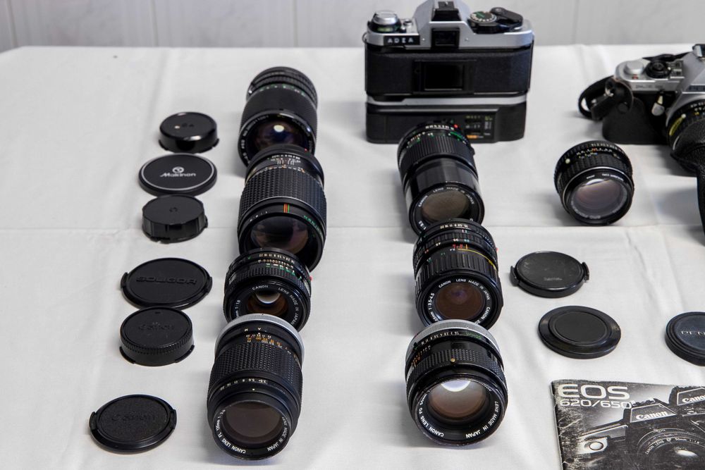 Lote de câmeras fotográficas+objetivas+acesórios