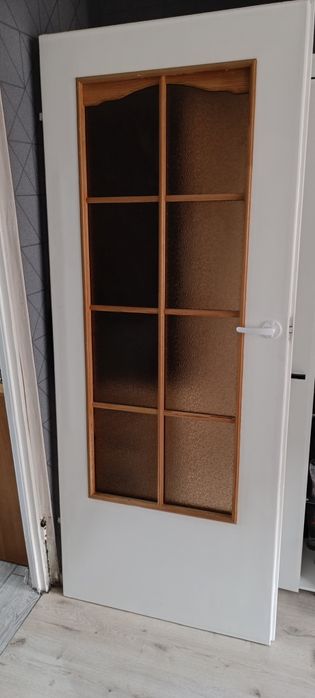 Drzwi z kratką i plexi zamki i klamki nowe