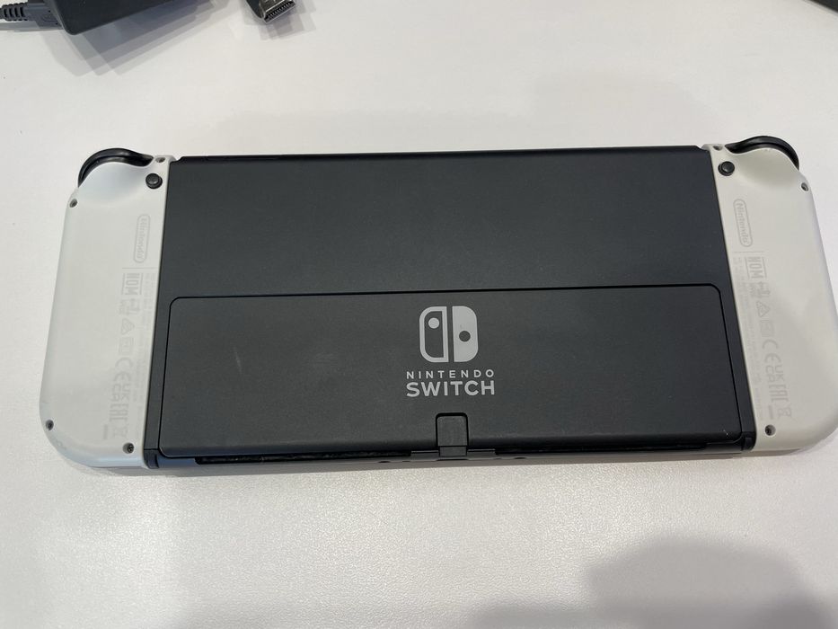 Nintendo Switch OLED б/у + гра Monster Jam + руль + док-станція