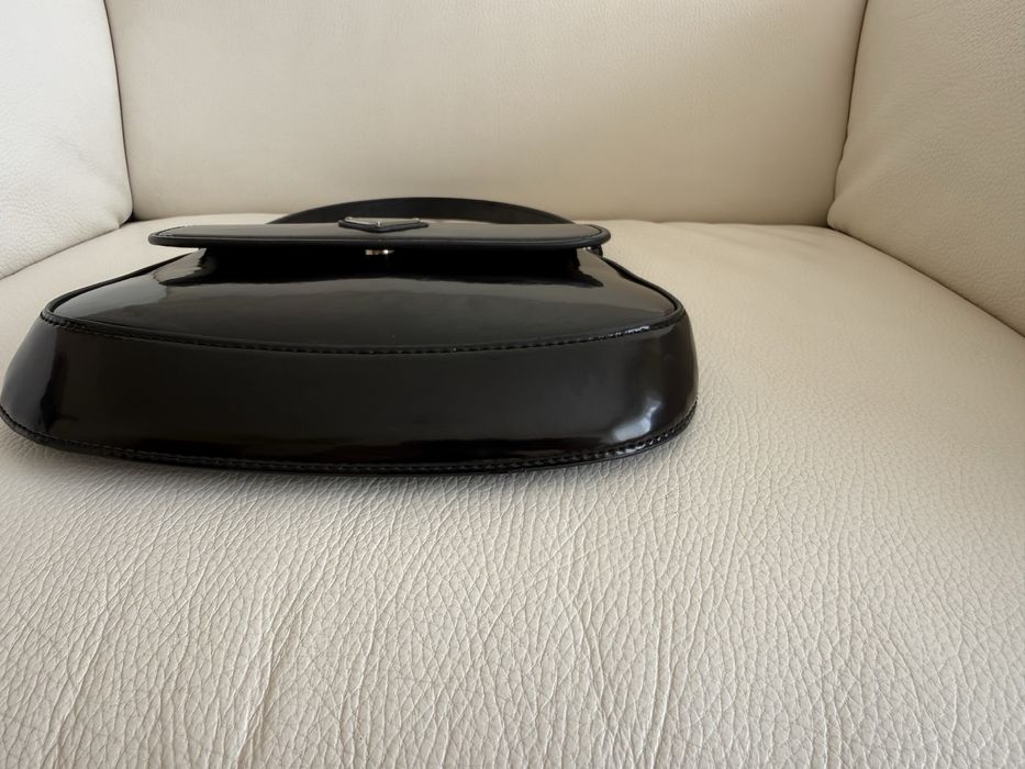 Prada.         burberry