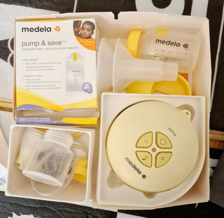 Kultowy laktator elektryczny Medela Swing + woreczki na pokarm